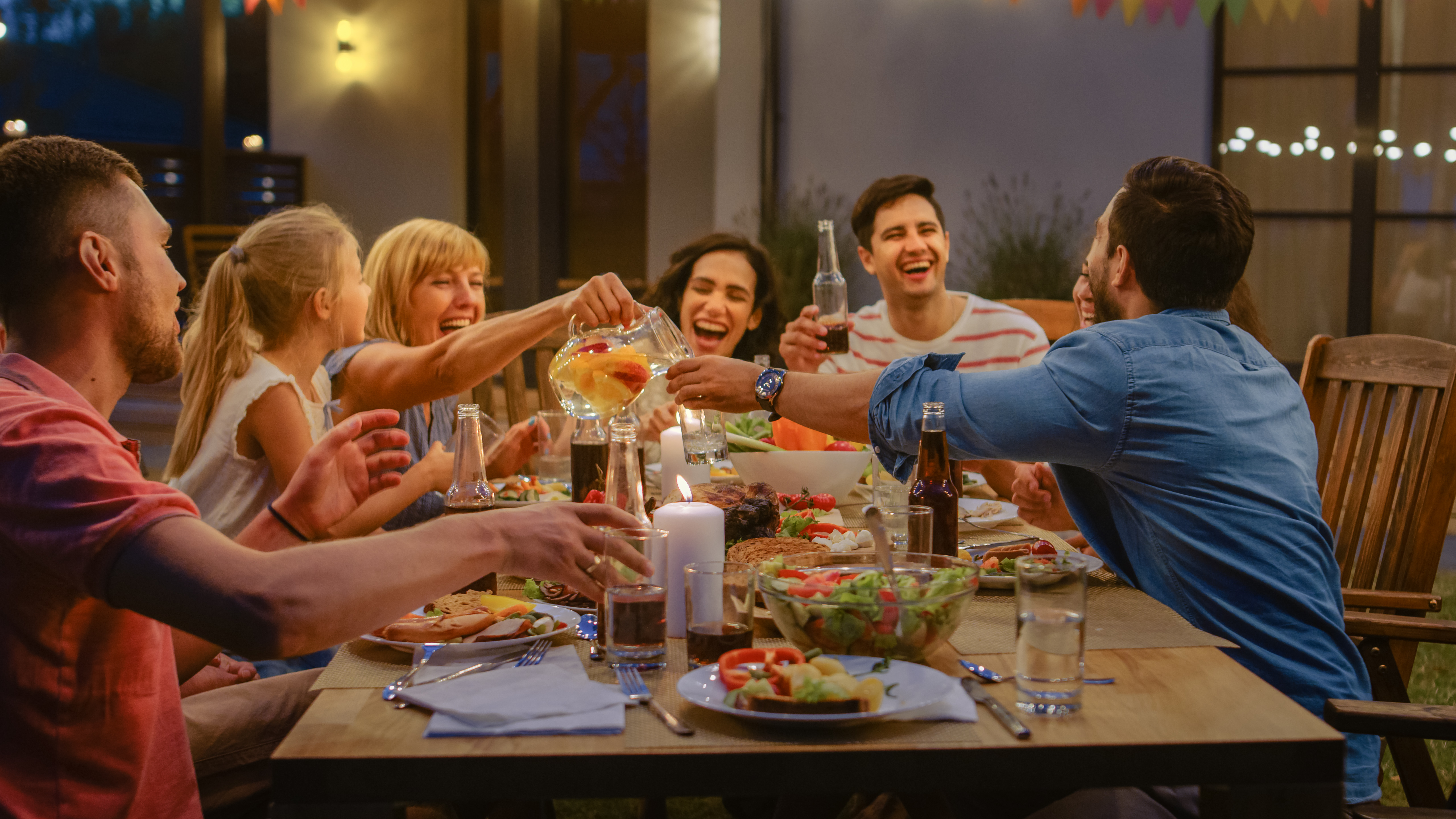 shutterstock image of friends laughing and eating